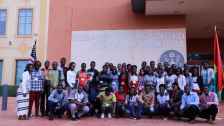 Boot camp number 2 students proudly standing in front of the US embassy Gate.