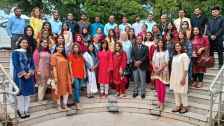 A group photo of advisers and counselors at the counselors networking tea organized by Islamabad center.